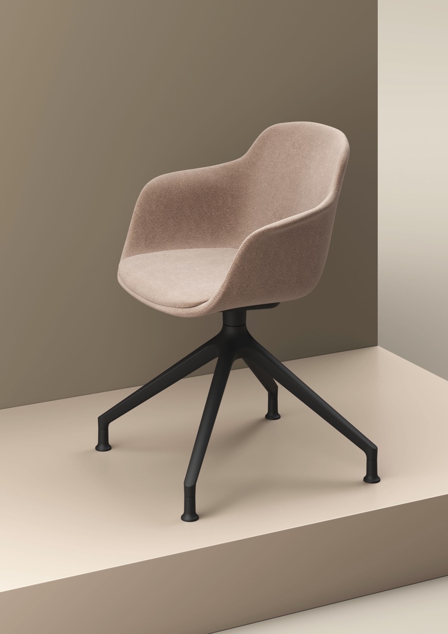 Loria Upholstered Arm Chair - 4 Star Castor in a warm contemporary interior